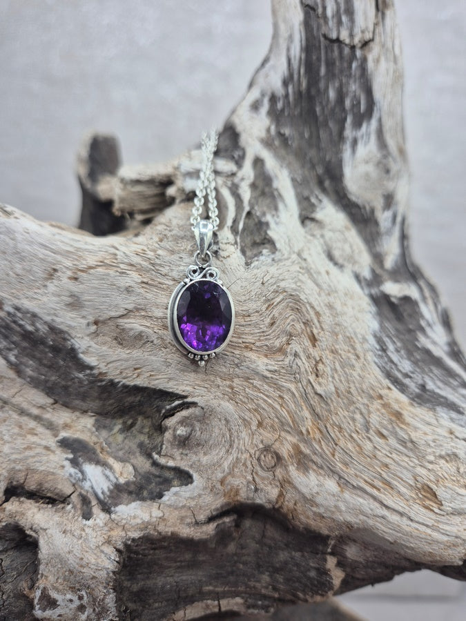 Pendentif améthyste facettée
