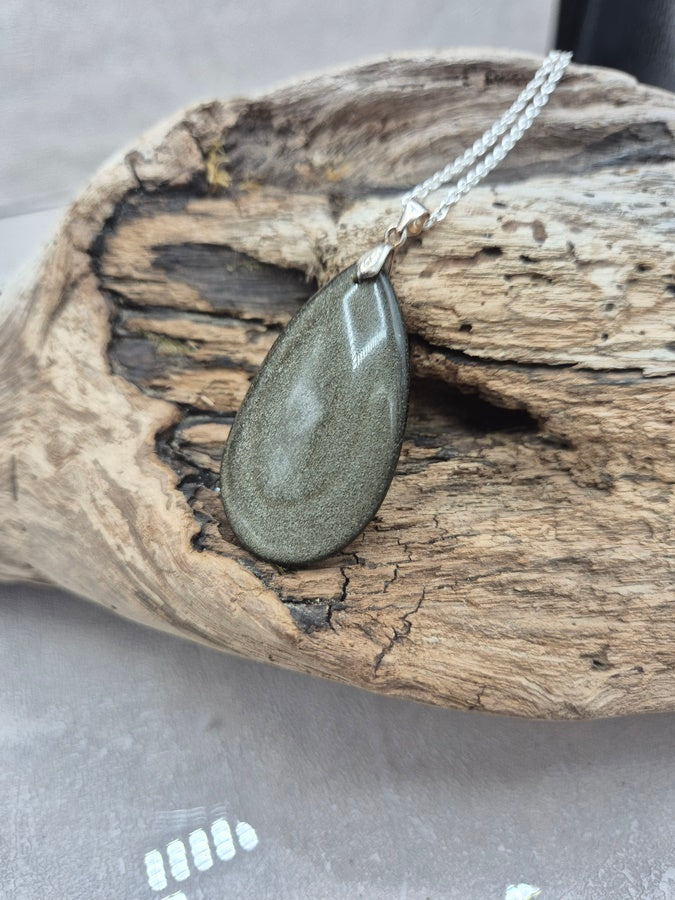 Pendentif Obsidienne dorée
